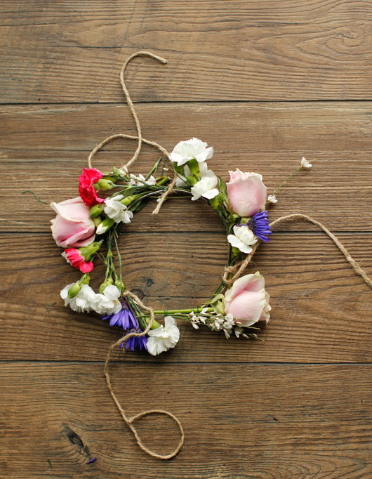 floral hoop with jute strings tied to it for a DIY hanging floral chandelier