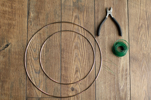 wire hoops, floral wire and wire cutters against a wood backdrop