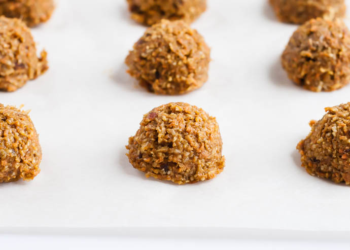 Carrot Cake Energy Balls on parchment paper