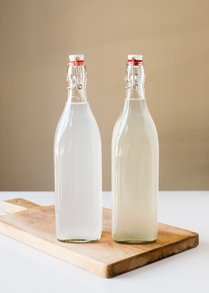 two glass bottles full of fermented water kefir