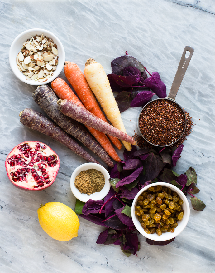 rainbow carrots, pomegranates, almonds, raisins, spices, lemons and quinoa