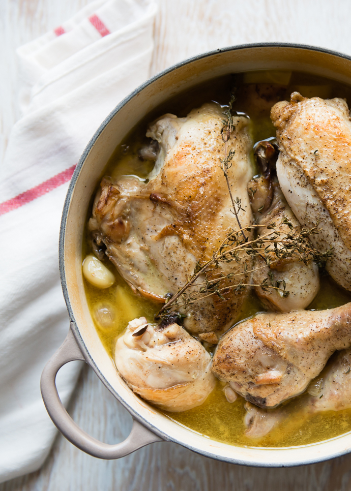 one pan roasted chicken and potatoes cooked in a large round Dutch oven