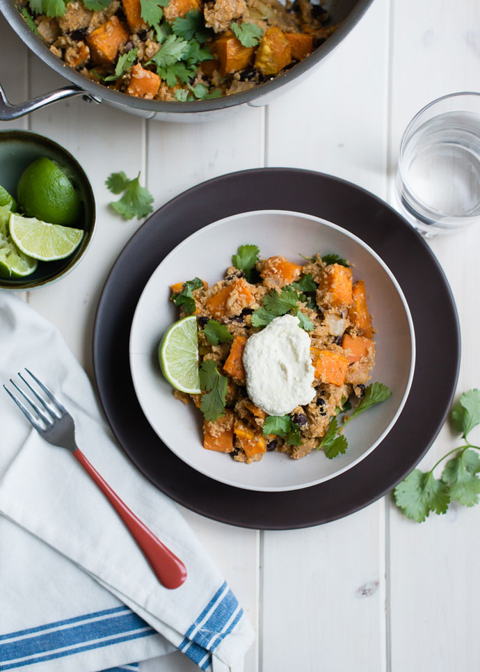 sweet potato bowl topped with cashew cream