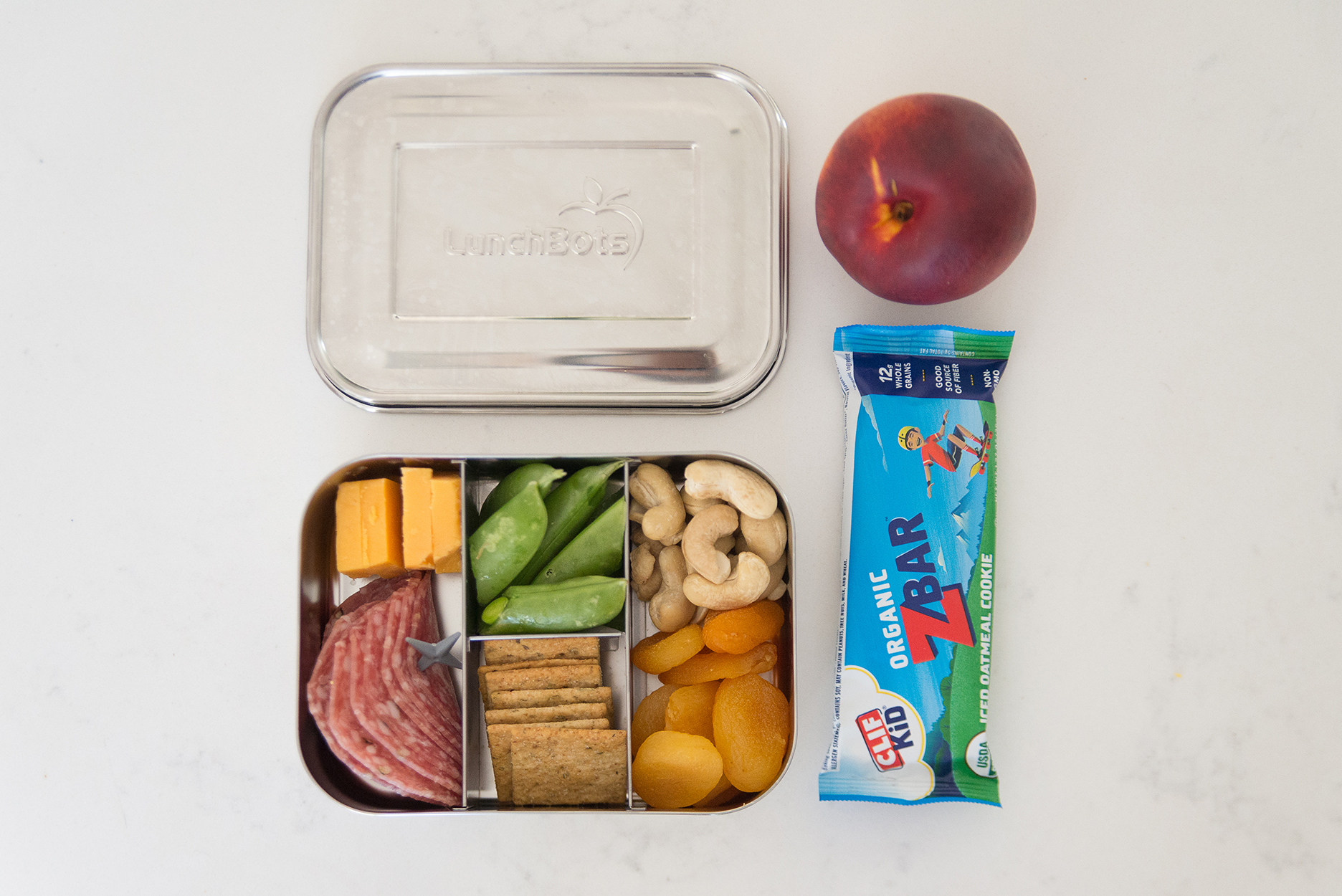 Stainless steel bento box kids lunch with a z par and peach