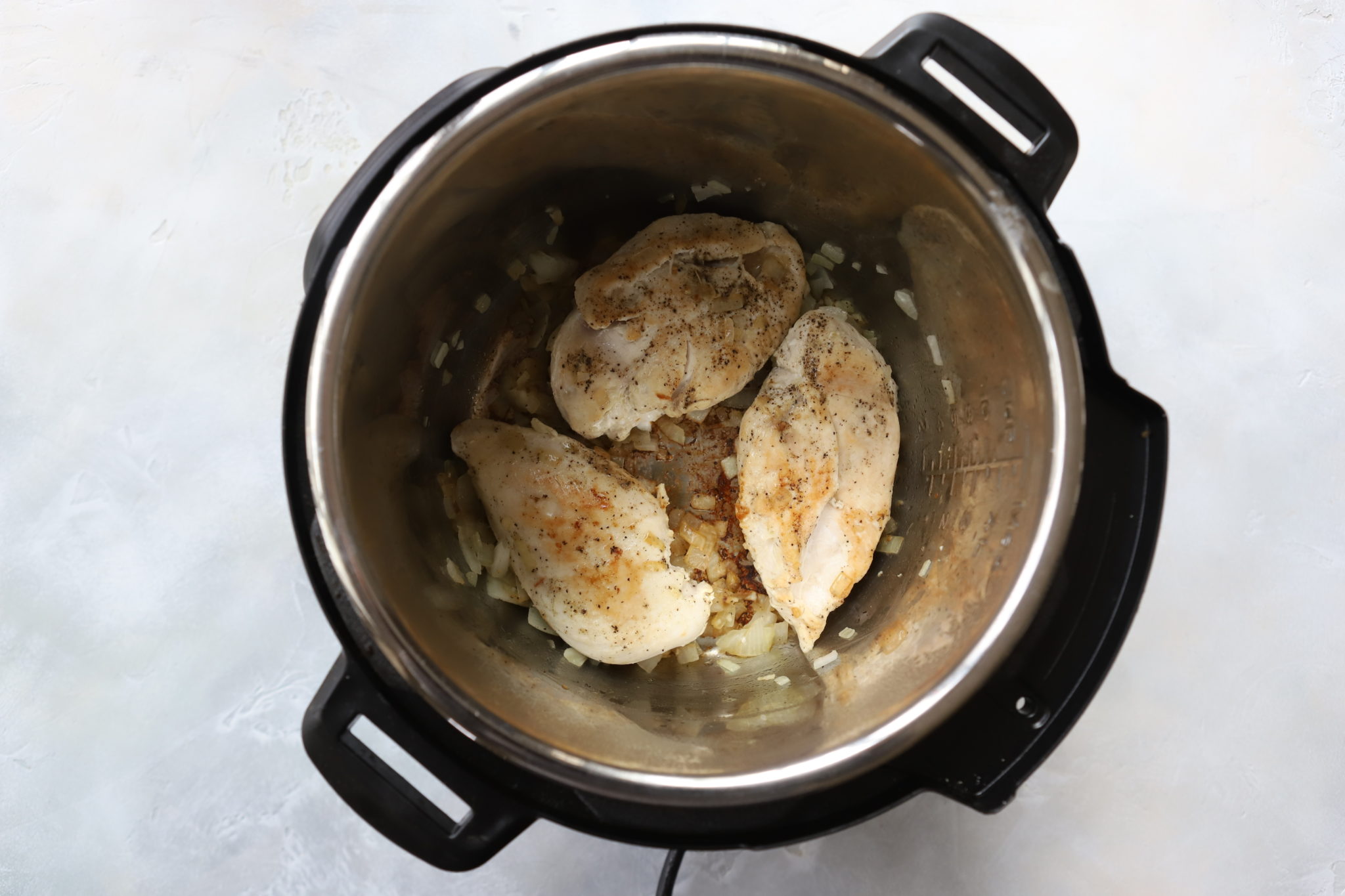 Chicken cooked in the Instant Pot for instant pot chicken alfredo pasta