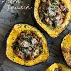 Roasted acorn squash with pork sausage and apple and chestnut stuffing