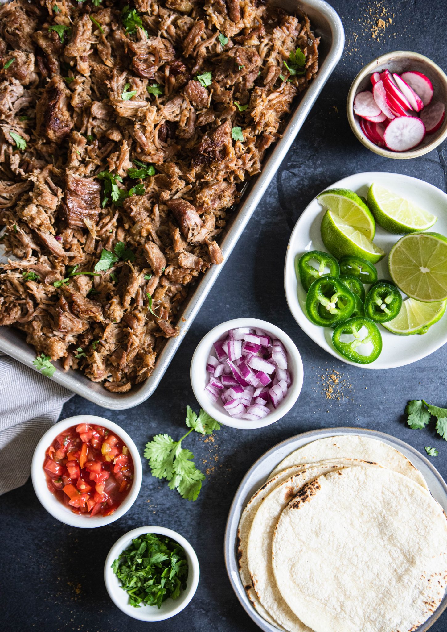 toppings for tacos and tortilla and pork carnitas