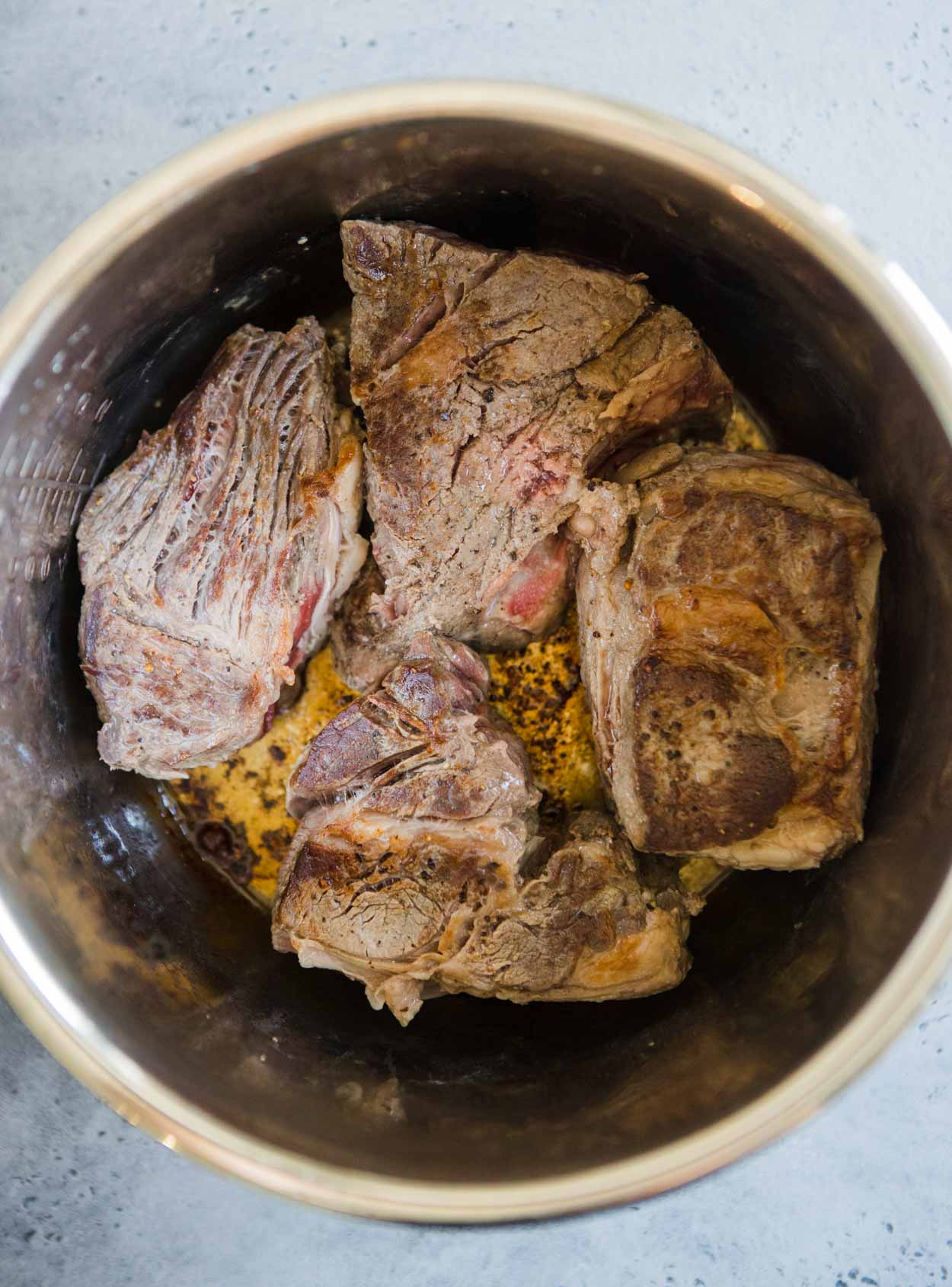 Sauteed beef chuck roast in an Instant Pot