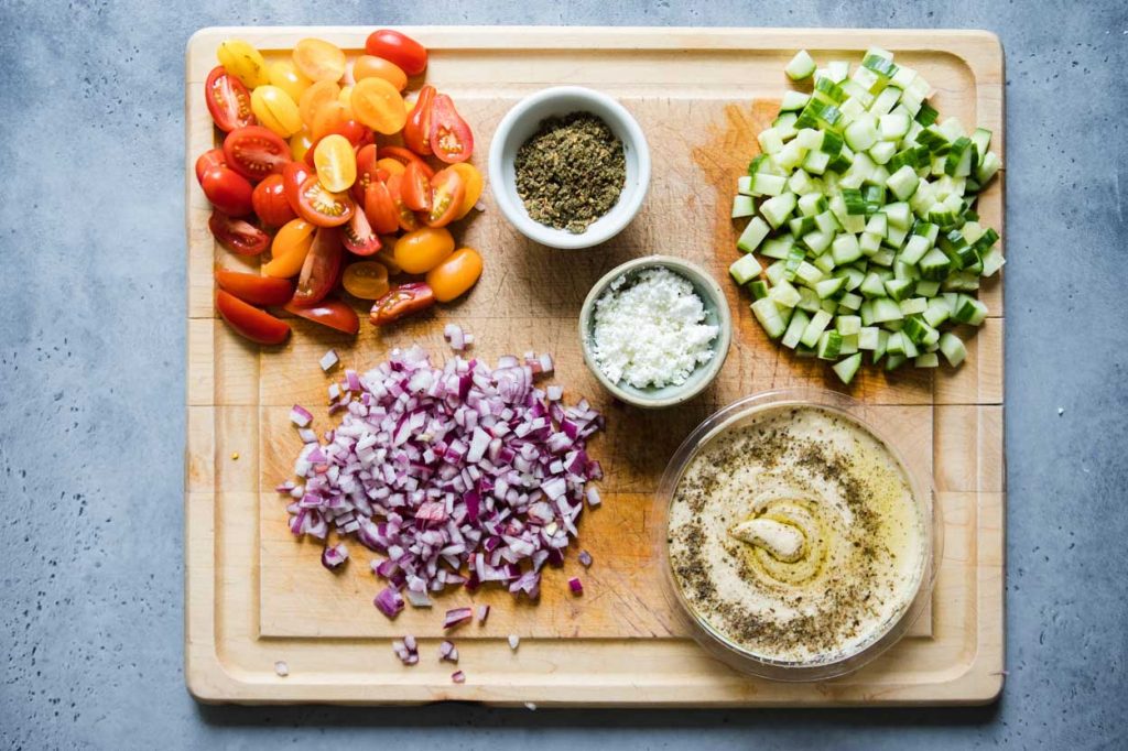 hummus ingredients prepped on a cutting board