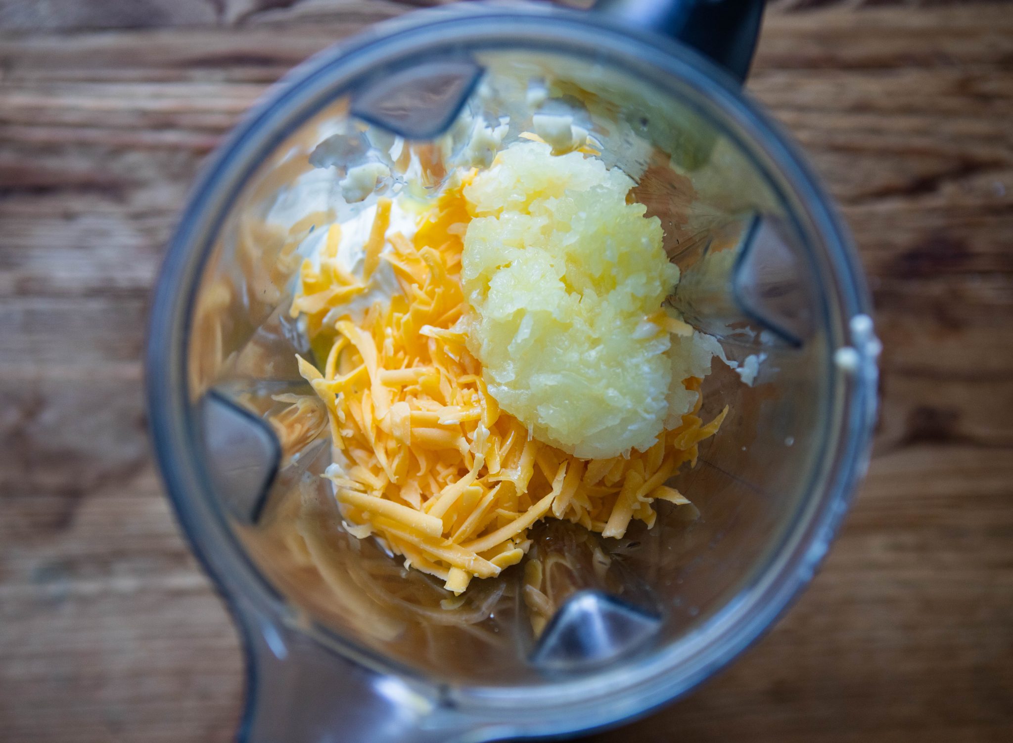 cheese, cream of chicken soup, onions and sour cream in a blender