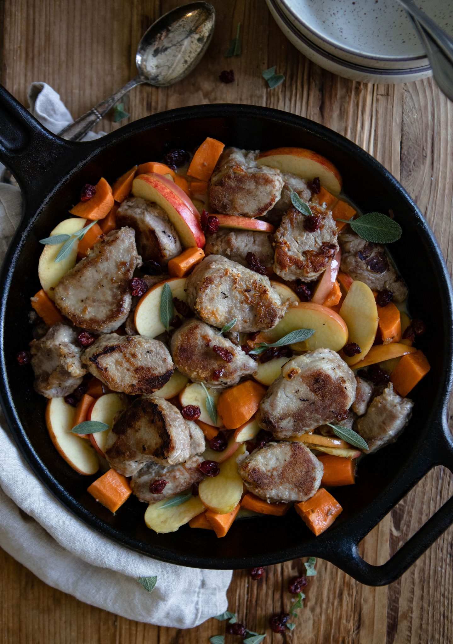 close up of pork tenderloin dish with apples and sweet potatoes