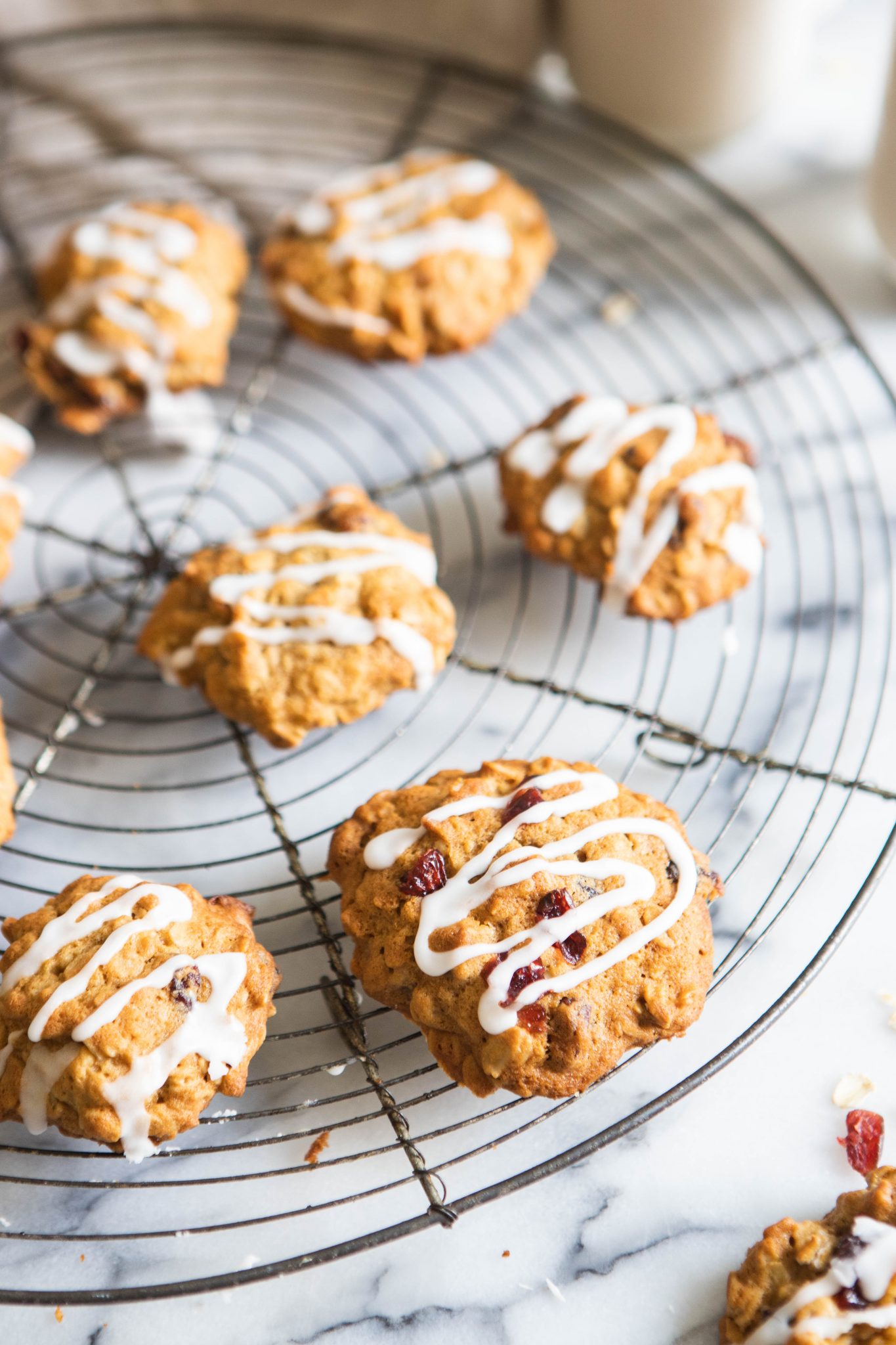 oatmeal cranberry cookies on a cooling rack