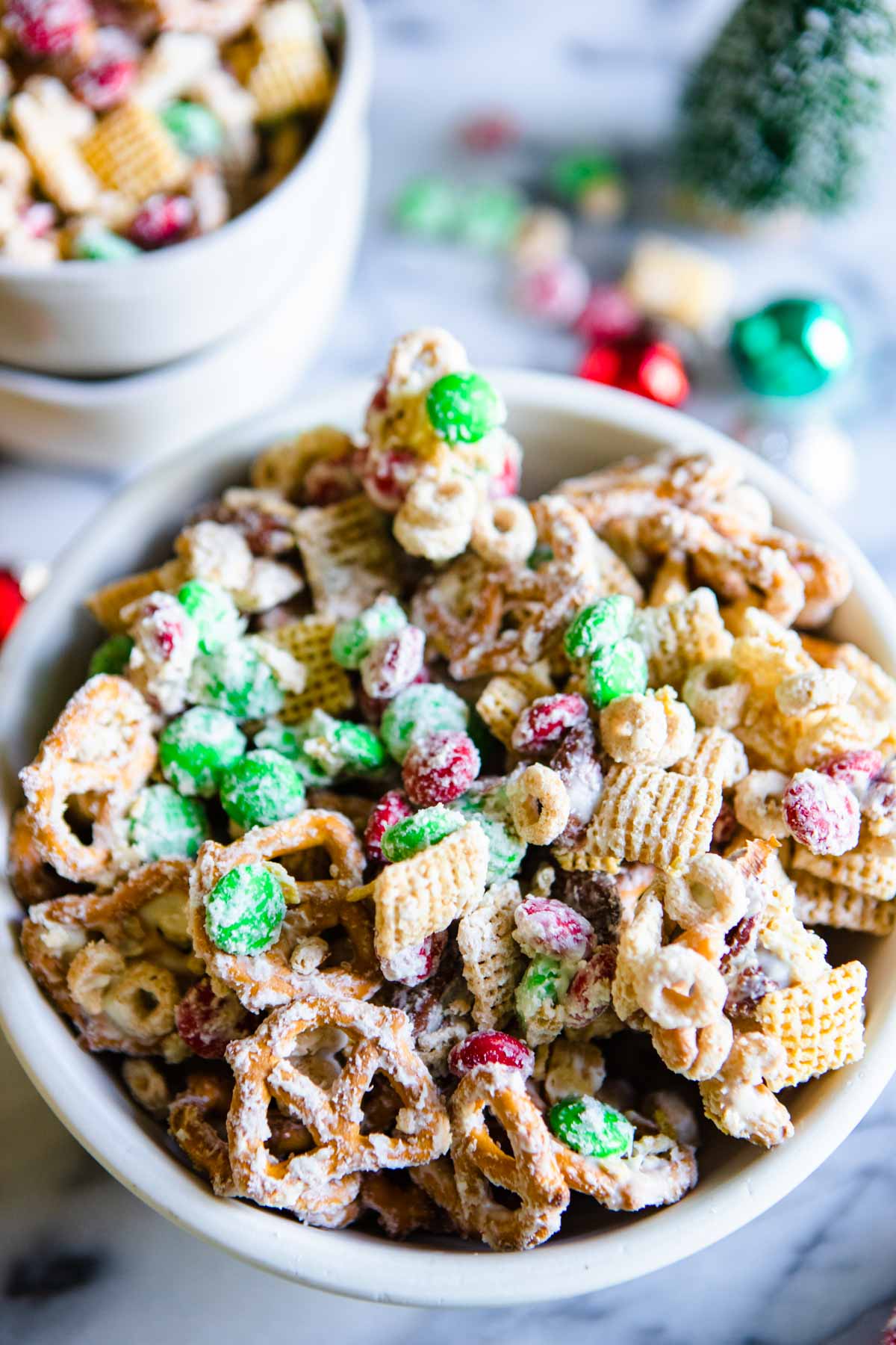 salty sweet Christmas snack mix in a white bowl