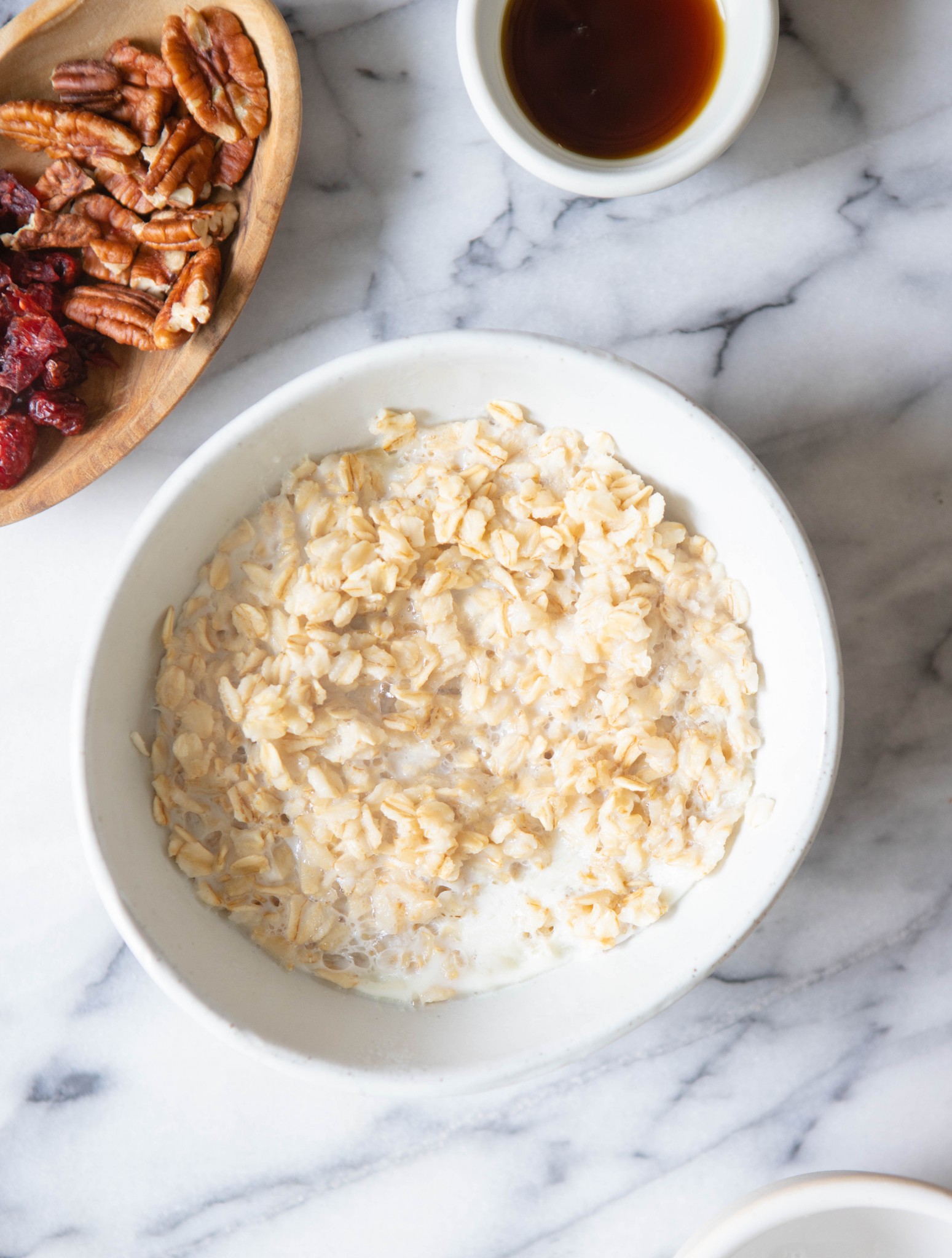 cooked oatmeal in a white bowl