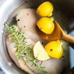 chicken breasts in a salt brine with lemons and rosemary