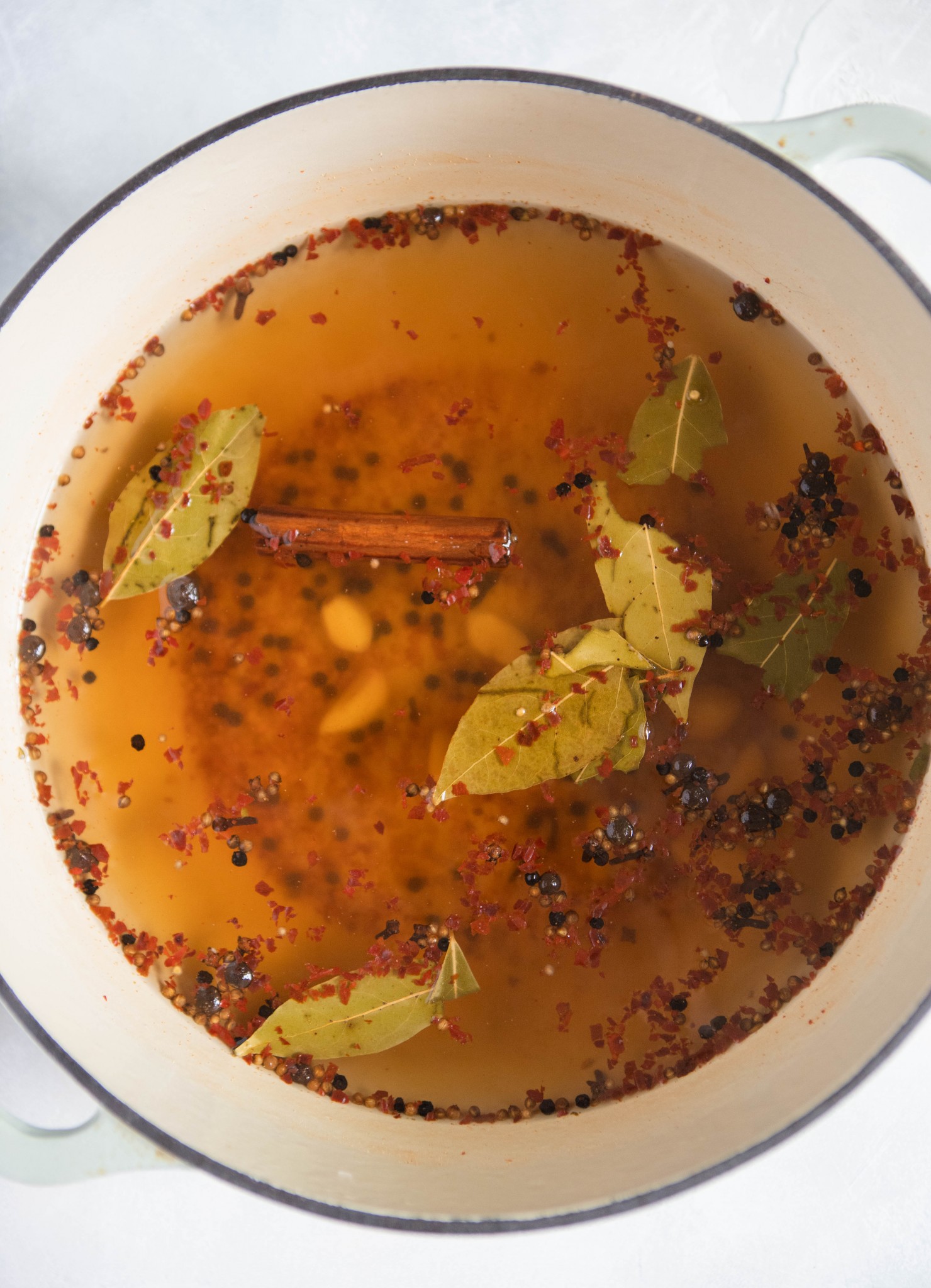 brine seasonings in water in a large stock pot