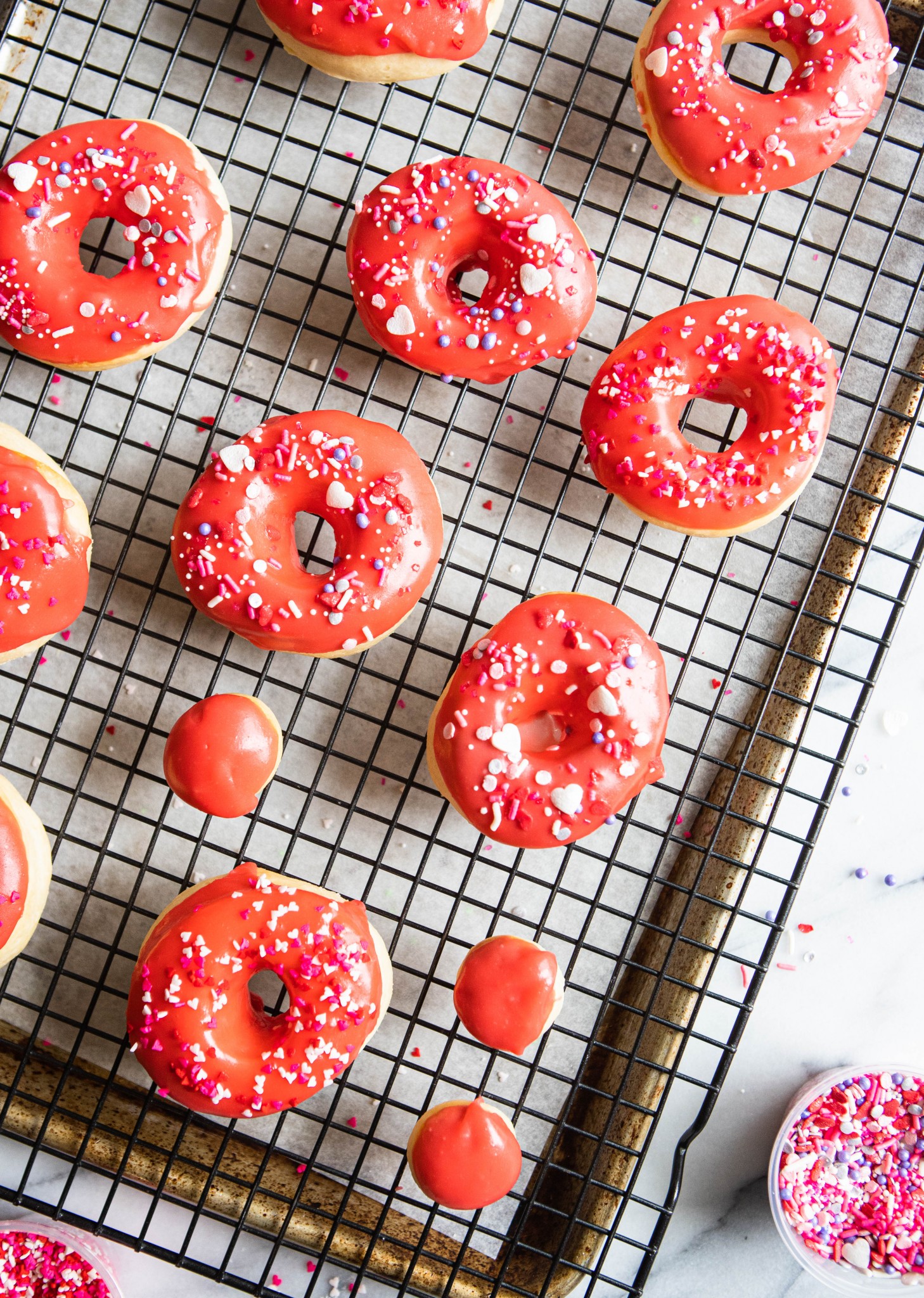 red glazed air fryer donuts on a cooling rack