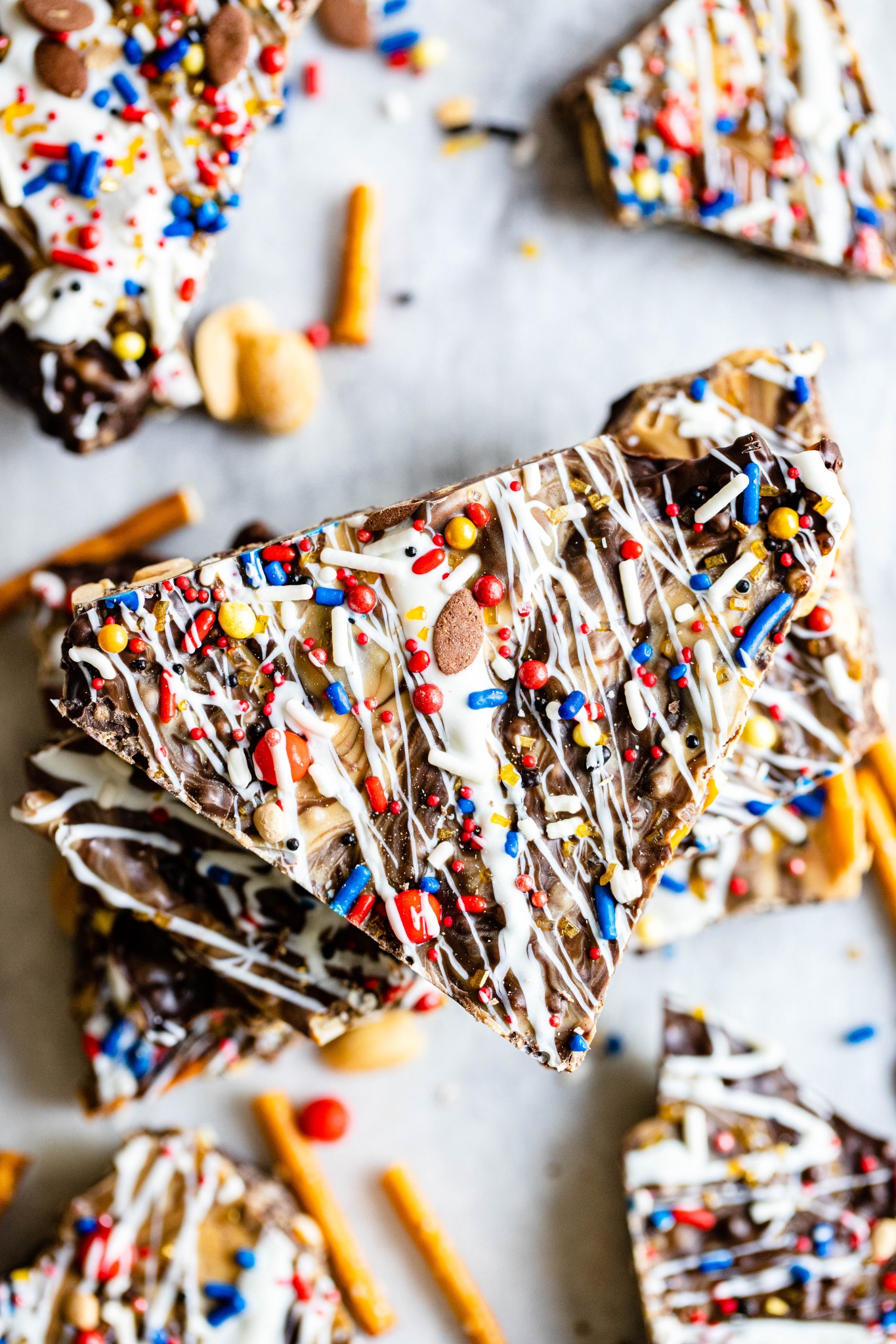 white chocolate drizzled on top of peanut butter and chocolate bark