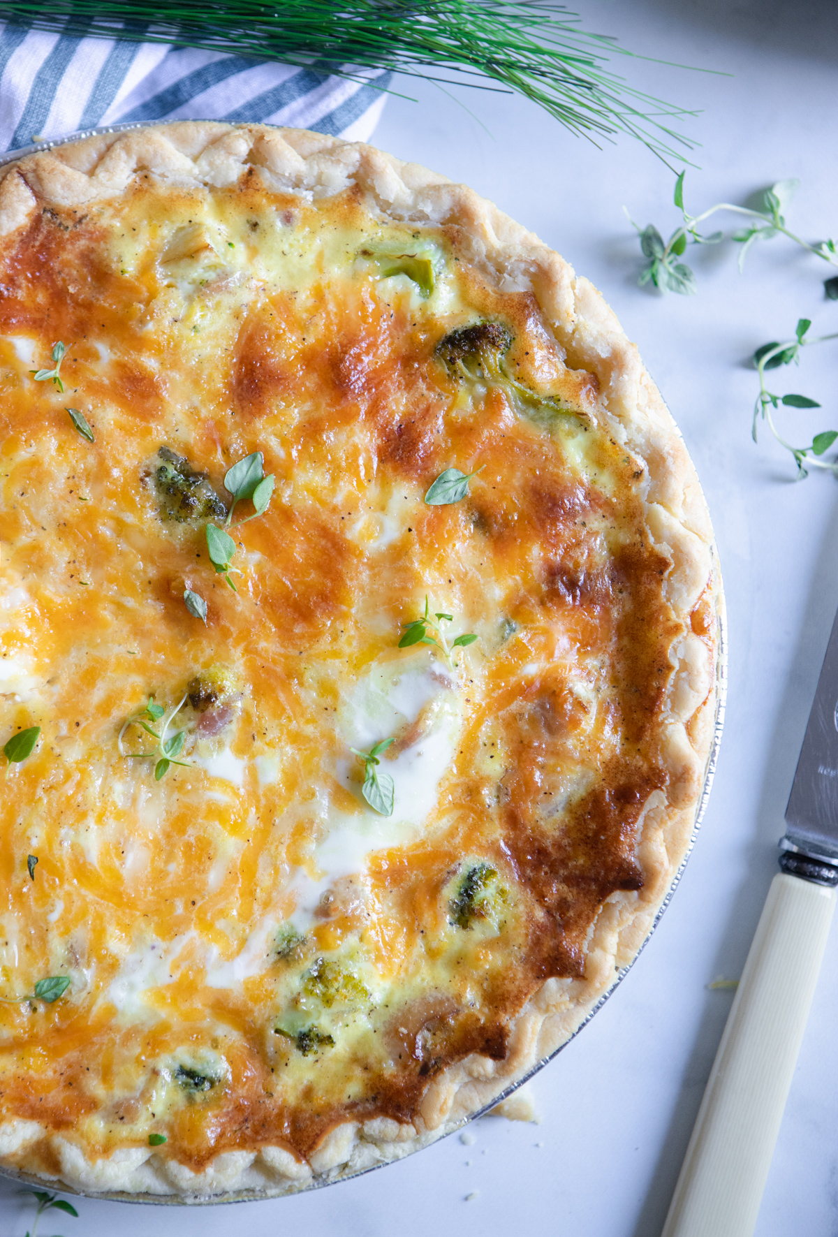 broccoli and bacon Christmas quiche in a pie tin