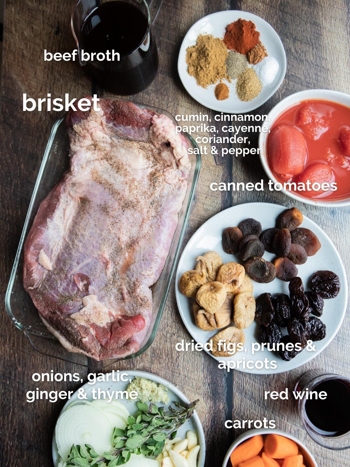 raw ingredients to make Christmas brisket on a wood board