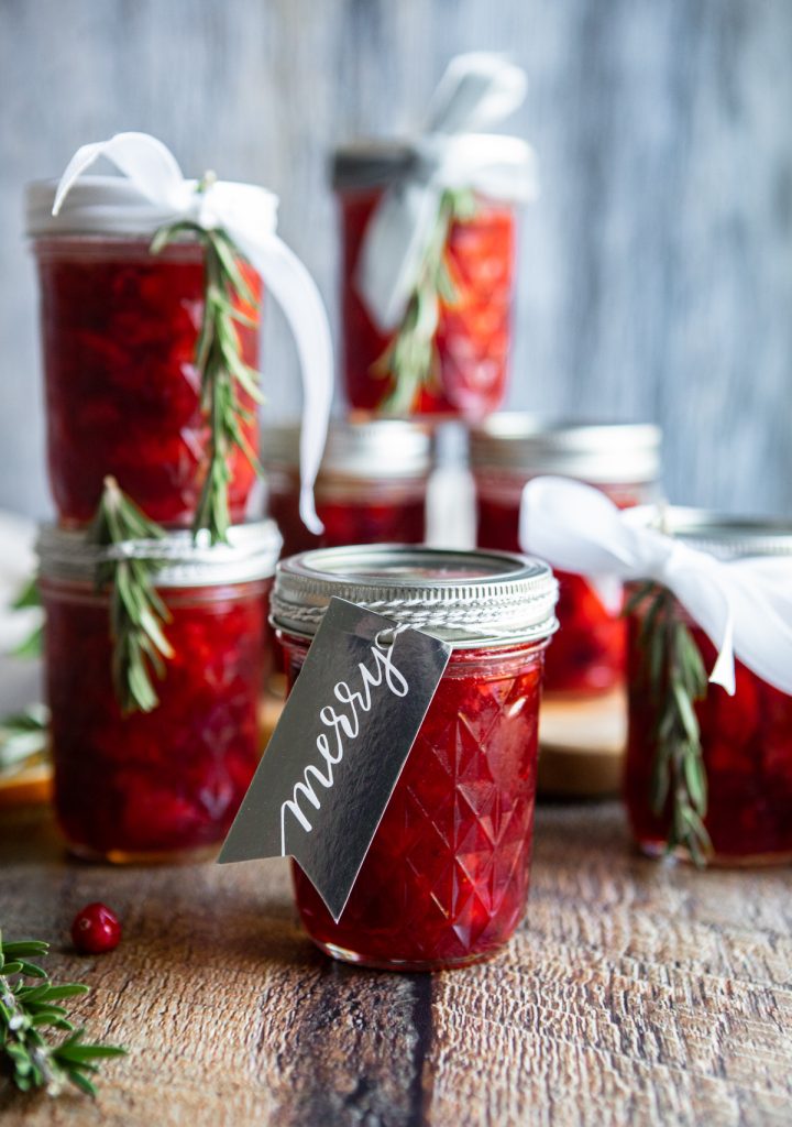 Holiday cranberry jam jars ready to be gifted