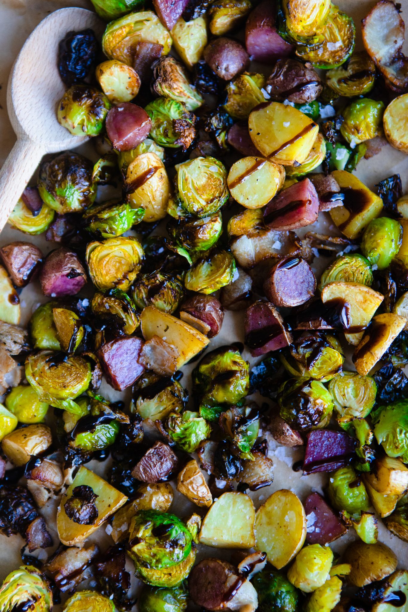brussels sprouts drizzled with balsamic glaze and tossed with potatoes and bacon 