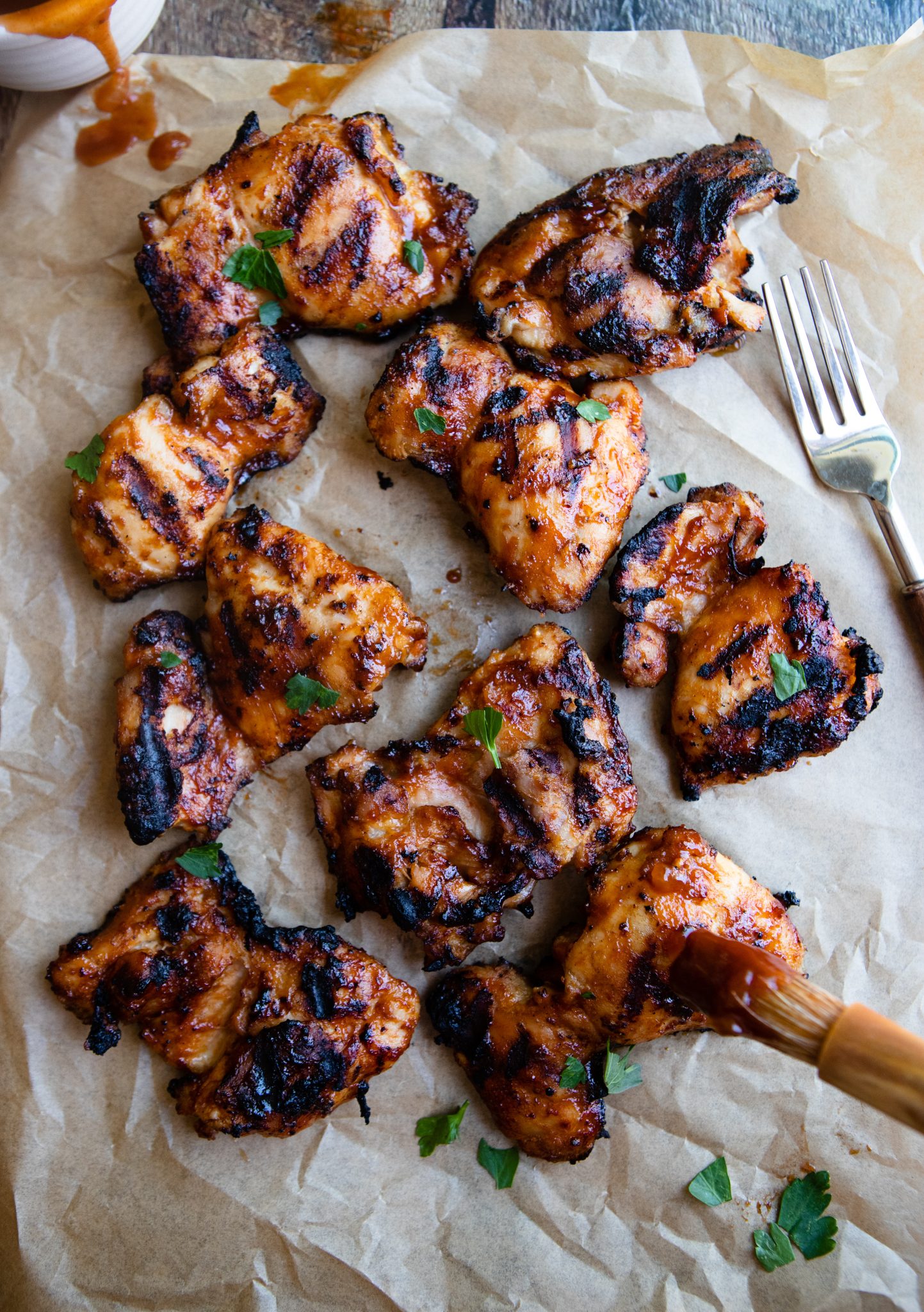 BBQ'd chicken thighs basted with homemade bbq sauce