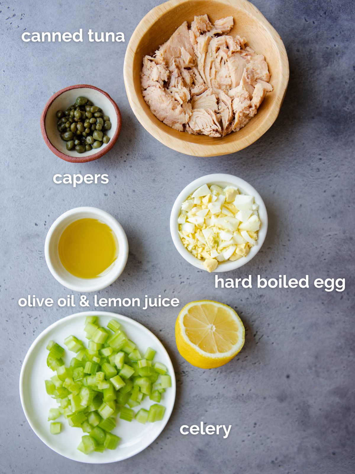 ingredients to make tuna salad with no mayo in white bowls