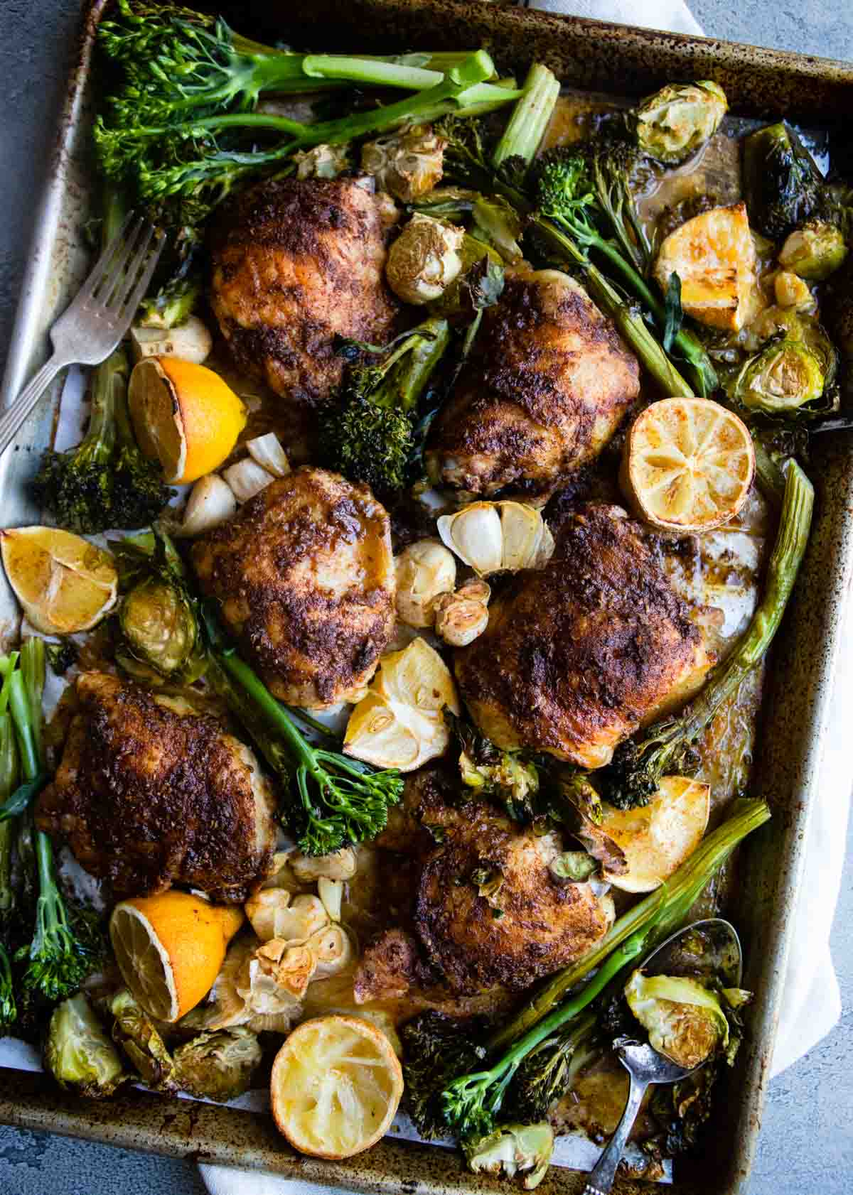 sheet pan chicken thighs and veggies with broccolini and brussels sprouts 