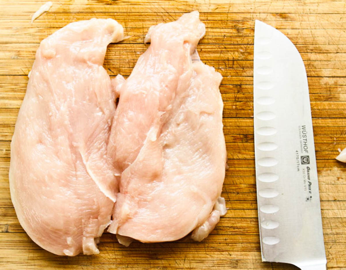 a large thick chicken breast sliced in half to make 2 thin cutlets 