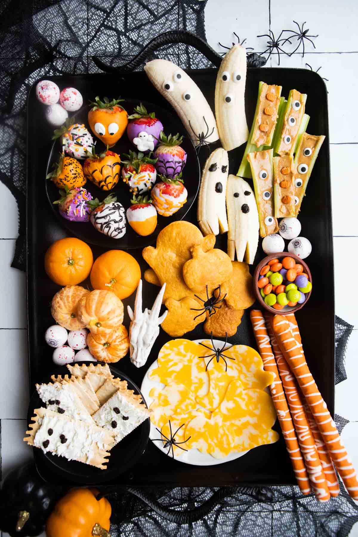 halloween snack board ideas on a metal tray