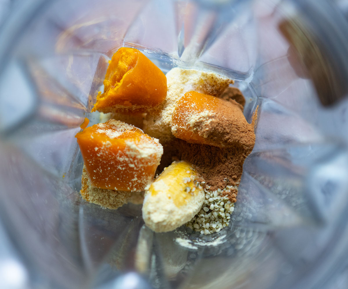 frozen pumpkin puree cubes in a blender to make a smoothie 