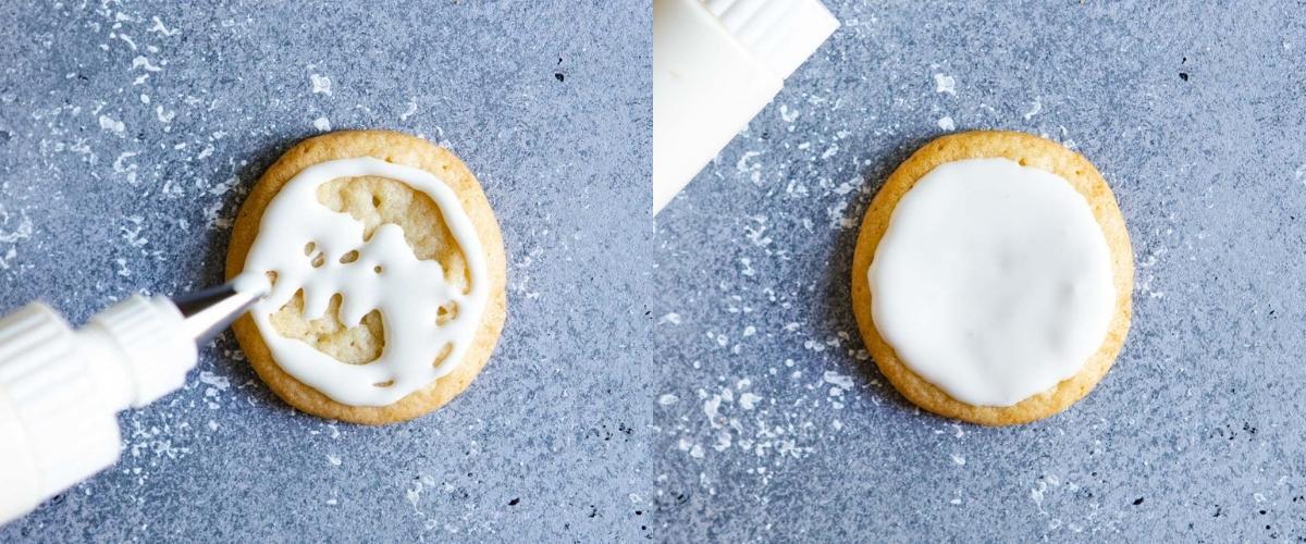 white royal icing being applied by hand onto a sugar cookie then flooded to fill the cookie