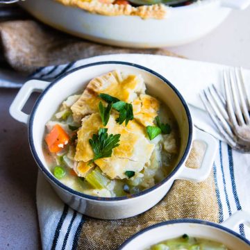 very small white dutch oven filled with homemade turkey pot pie in air fryer