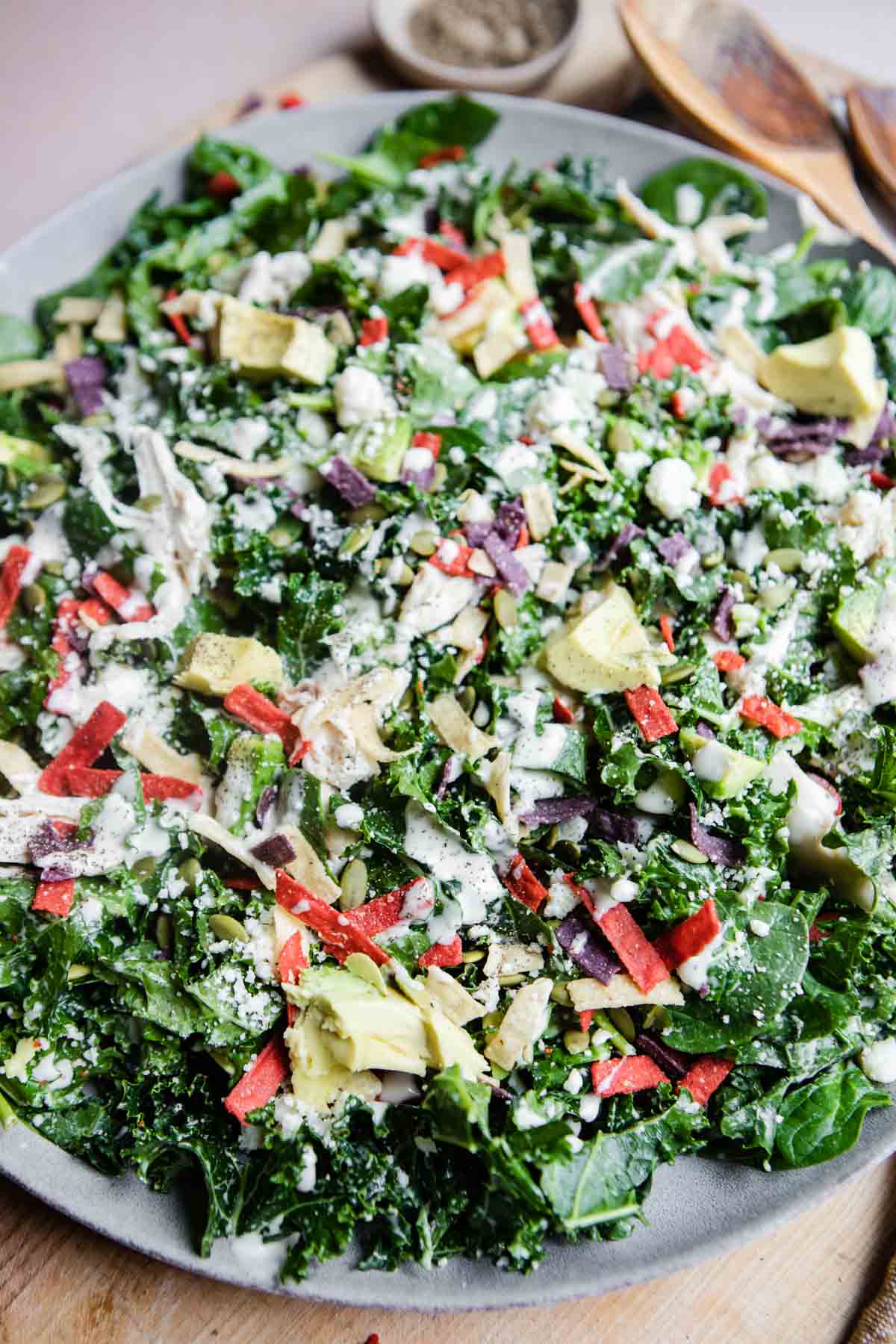 spinach and kale salad with fiesta style mix ins