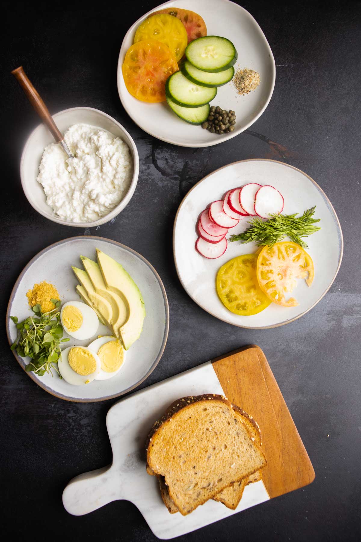 fresh veggie ingredients to top on savory cottage cheese toasts 