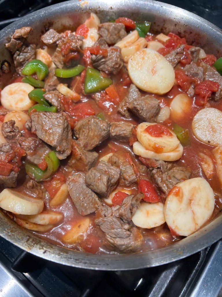 steak picado warming in a frying pan