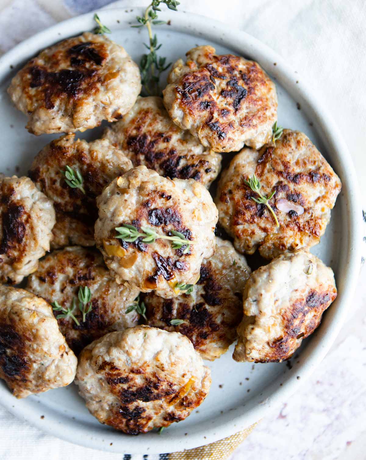 a plate of pork sausage patties made in the air fryer