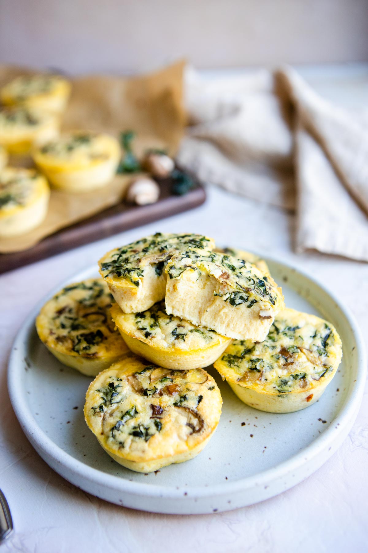 a plate of mushroom and kale egg bites