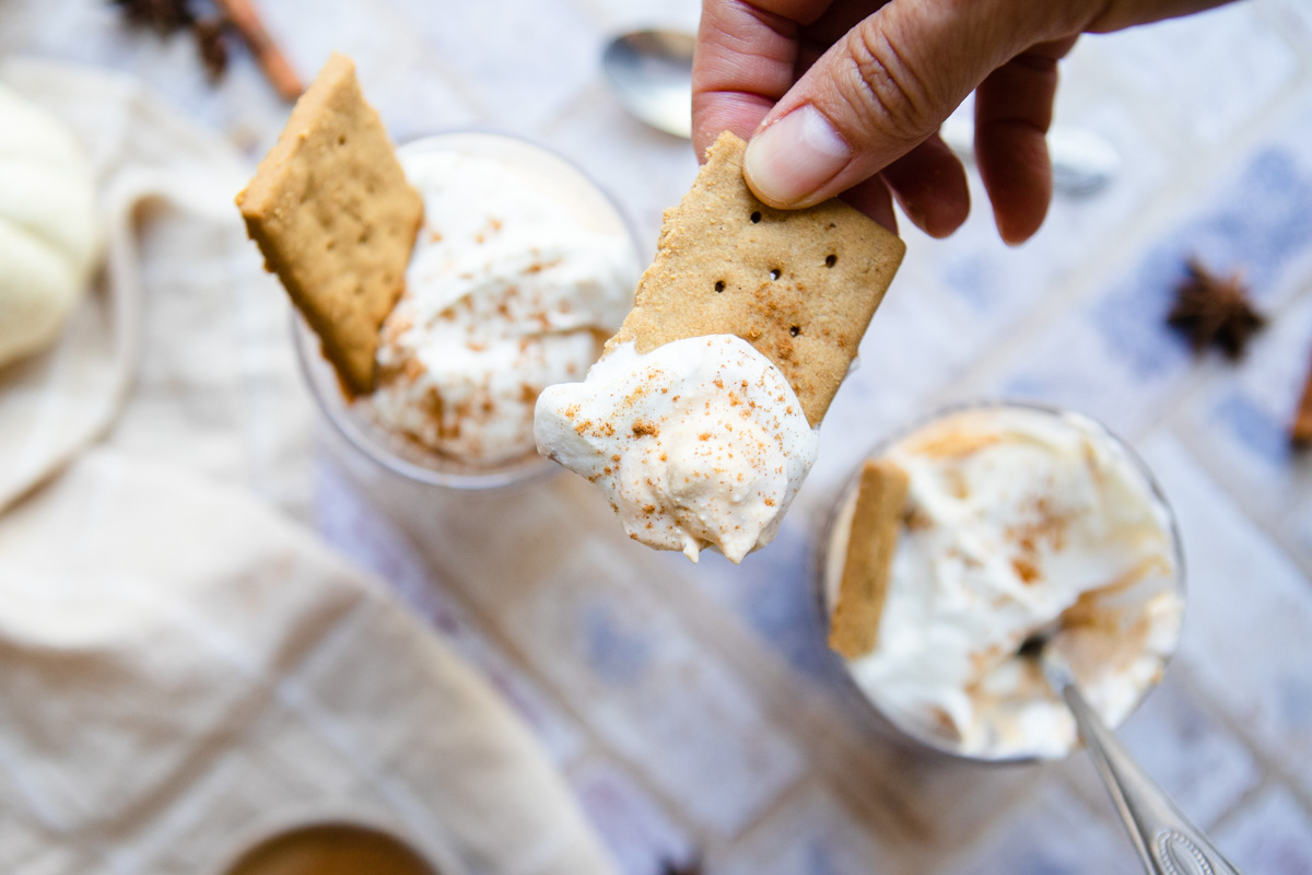 pumpkin fluff scooped out onto a graham cracker 