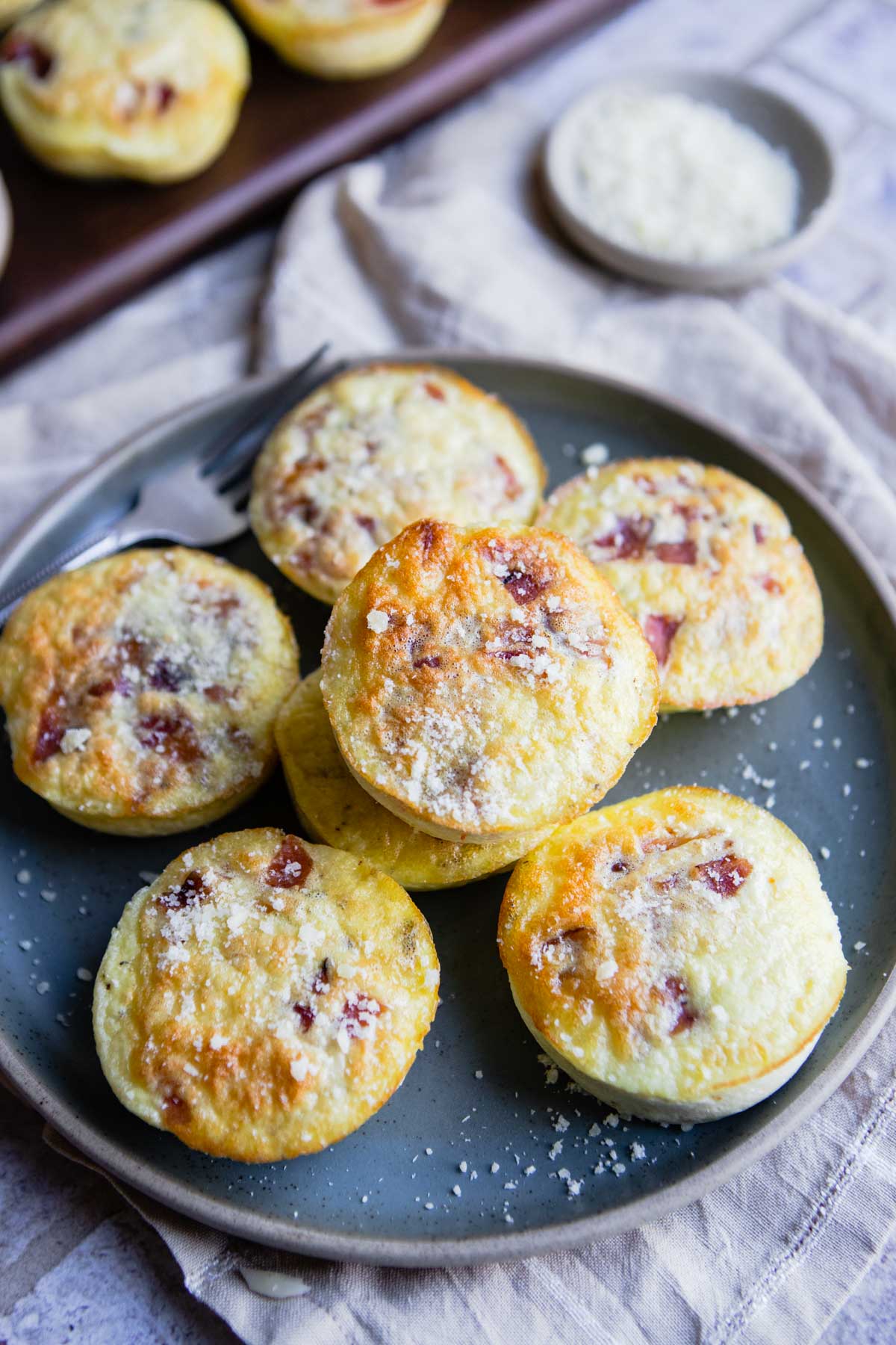 bacon egg bites on a gray plate 