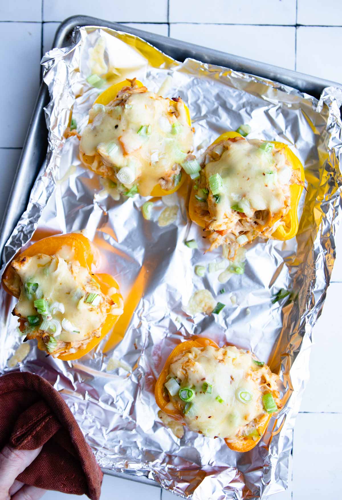 cooked buffalo chicken stuffed peppers taken out of the oven 