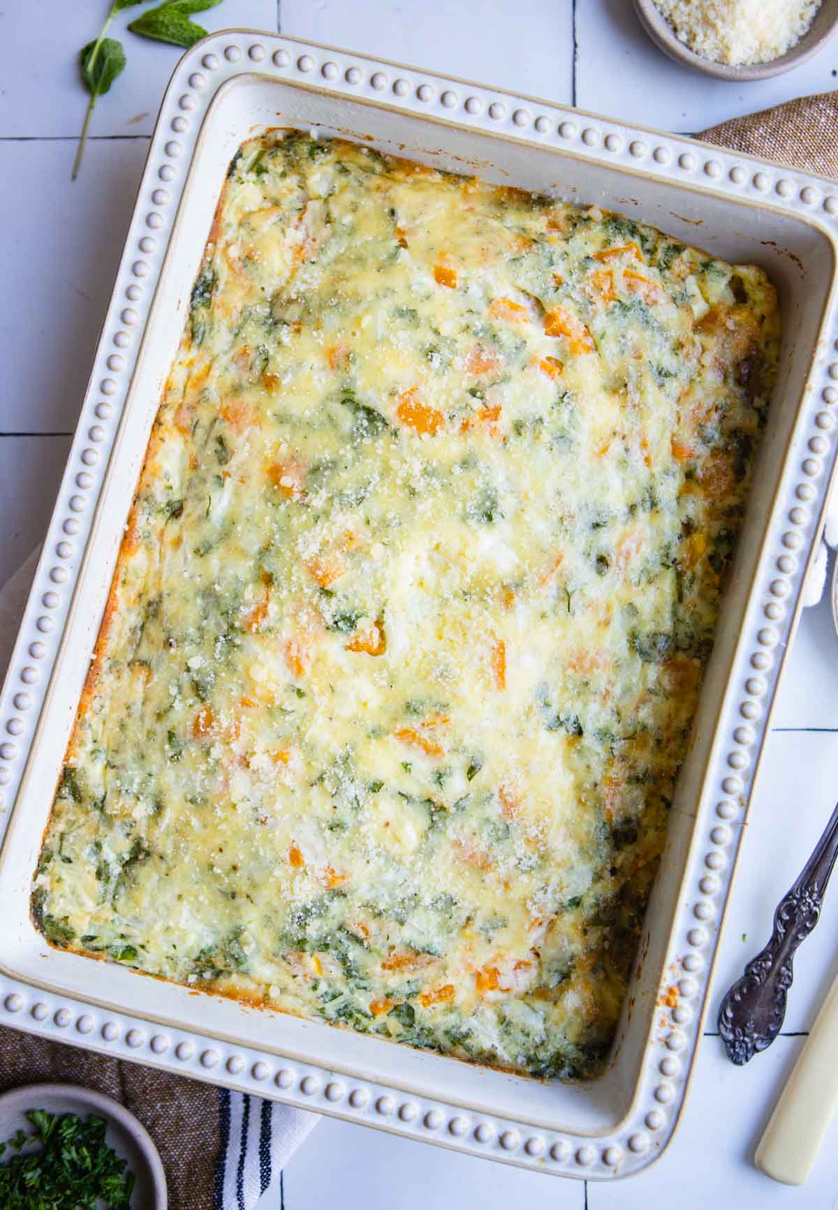 casserole dish filled with a baked cottage cheese egg dish 