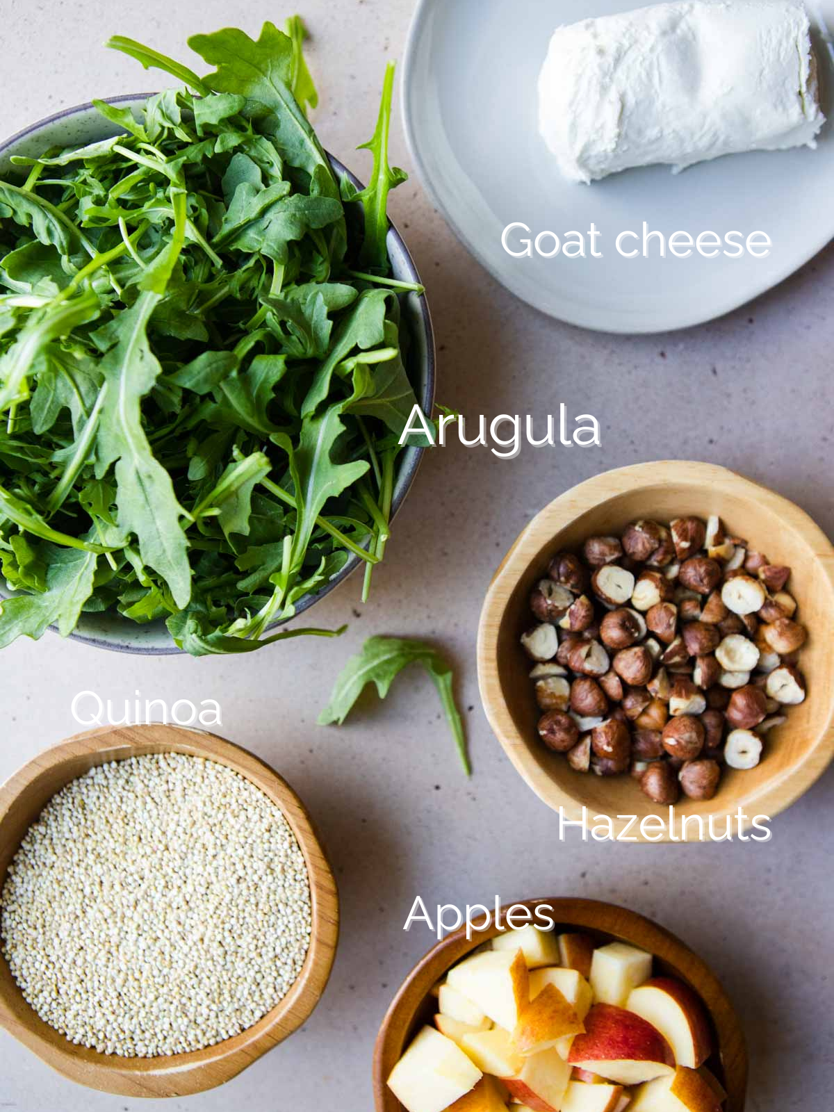 raw ingredients to make arugula salad with quinoa 