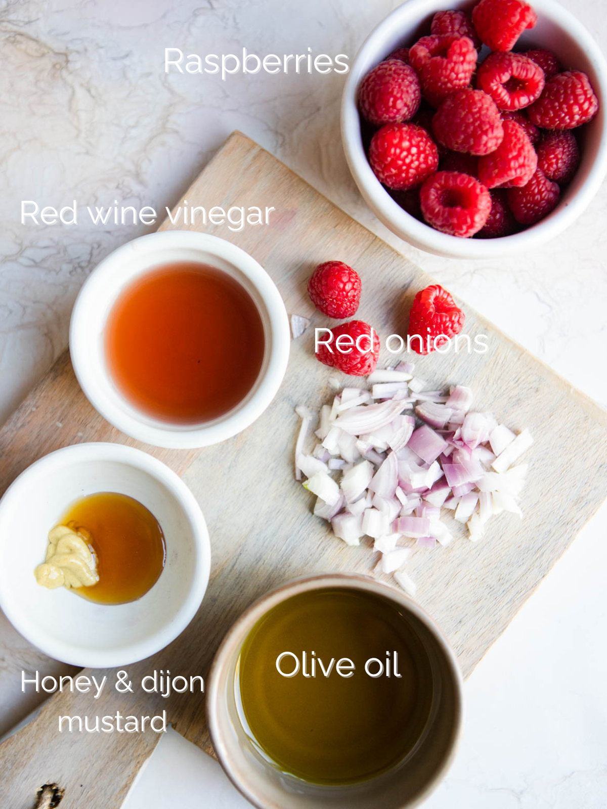 ingredients to make a raspberry vinaigrette 