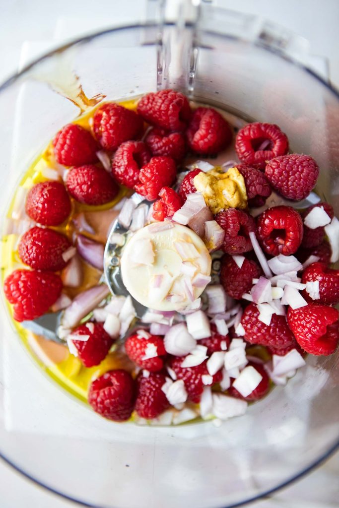 ingredients to make raspberry vinaigrette in a food processor