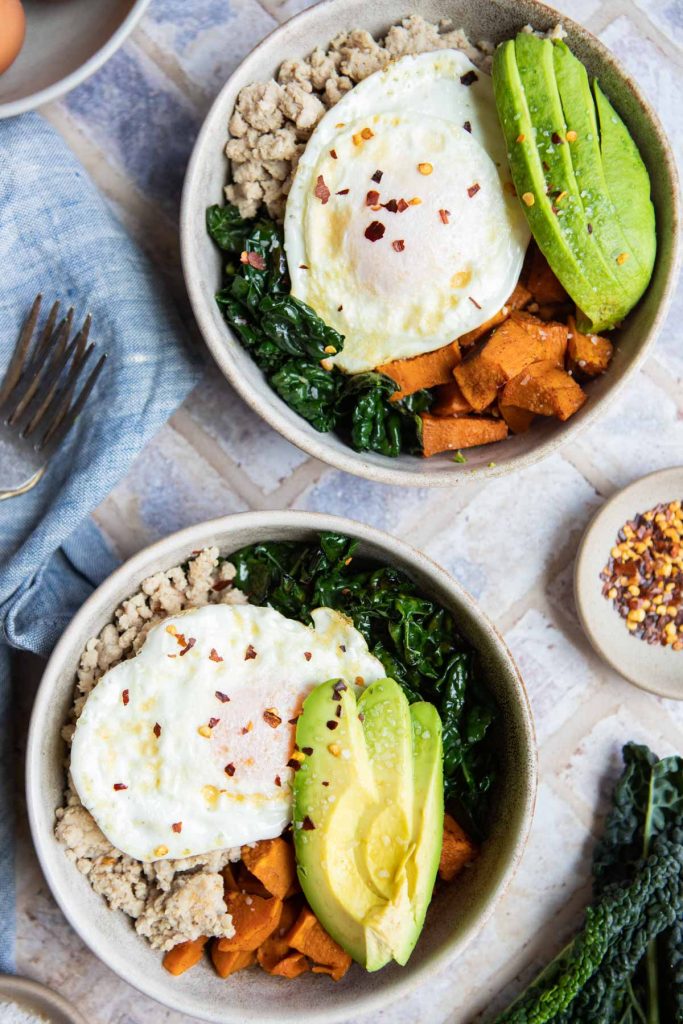 sweet potato breakfast bowls assembled in 2 round beige bowls