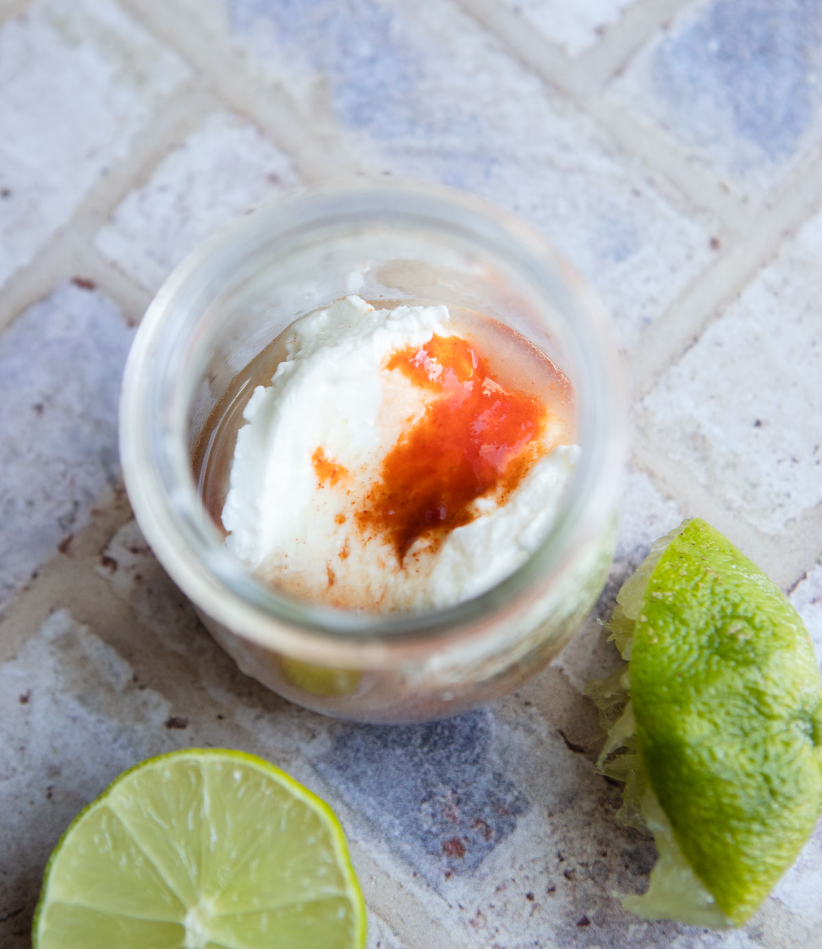 Greek yogurt, lime juice and hot sauce to make a special burger sauce