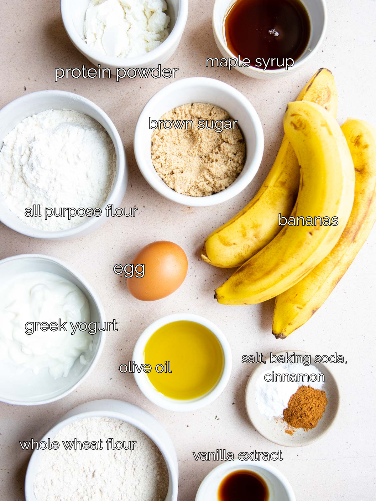 ingredients to make banana protein muffins on a table