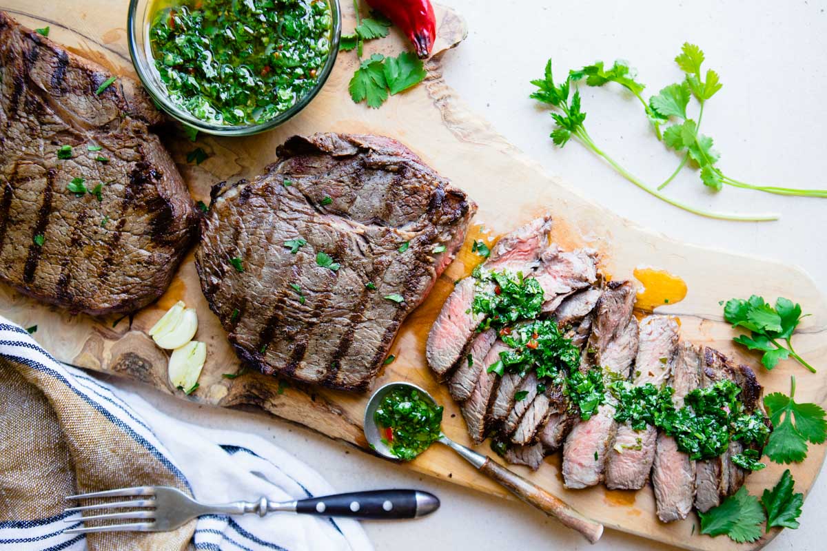 grilled top sirloin with cilantro chimichurri sauce all over